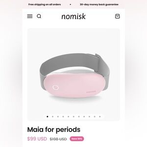 Heated massaging pad for cramps and bloating